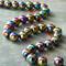 12 Pack: Rainbow Reconstituted Hematite Round Beads by Bead Landing™